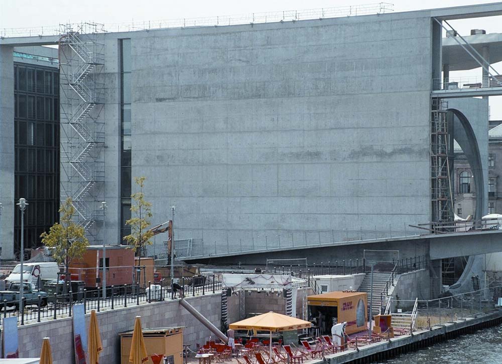 A before image of a tall parliament building that is discoloured