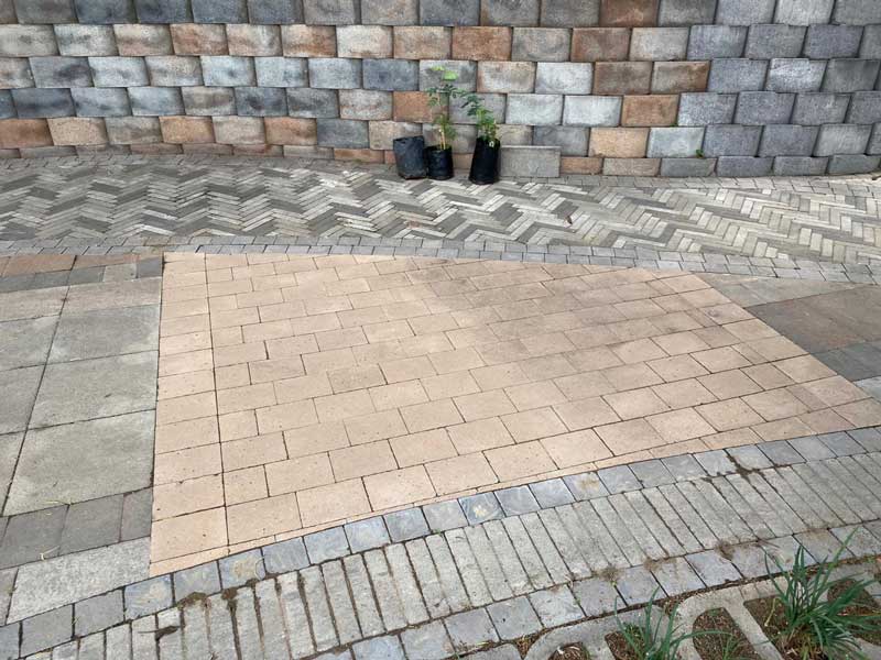 Clean and revive dirty concrete paving